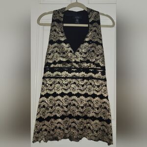Dressbarn Black and Gold Sleeveless V-Neck Shirt.